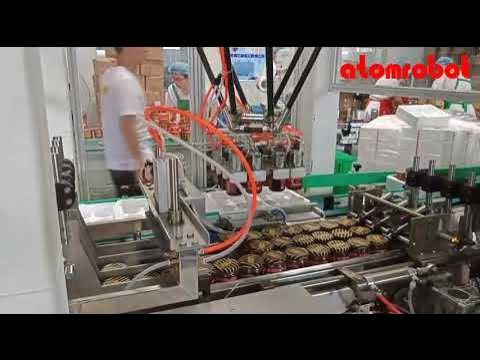 AtomRobots's tweet card. Automation solution for loading cans into trays