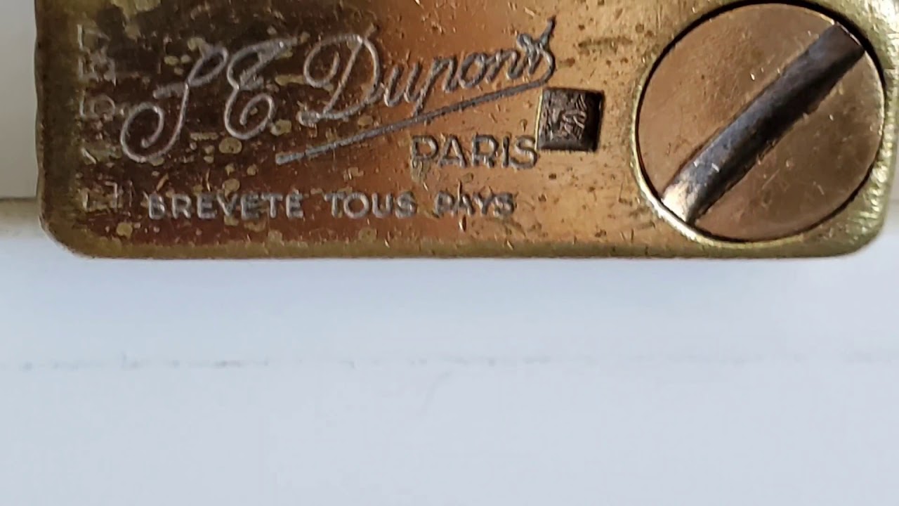 DupontLighters's tweet card. Ancient S.T. Dupont petrol lighter