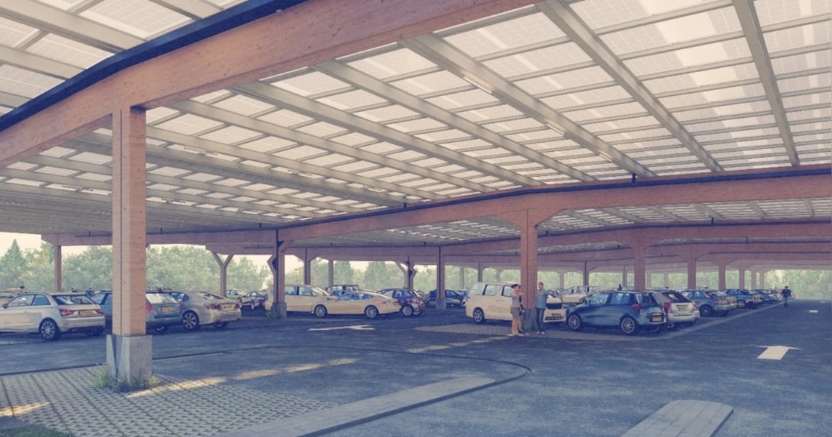 CodeAsm_'s tweet card. Op het terrein van Achmea in Apeldoorn moet komende zomer een enorme circulaire zonnecarport verrijzen. Er komen ruim 5300 zonnepanelen op het dak en de constructie biedt parkeerruimte aan 925...