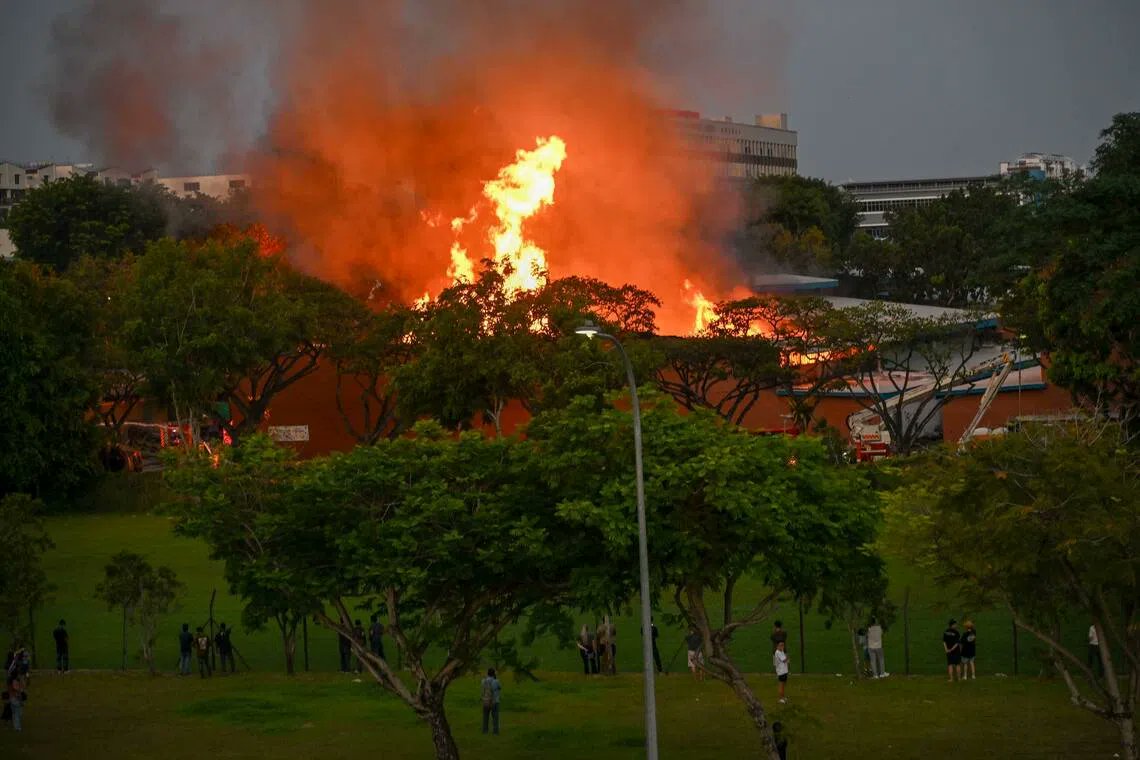 HaggerDarren's tweet card. The fire, which involved building materials and office equipment, had engulfed three workshop units, said SCDF. Read more at straitstimes.com. Read more at straitstimes.com.