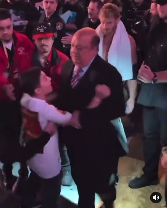 seanmplo's tweet card. Paul Heyman is under fire as he seen pushing a kid away from him! 😬