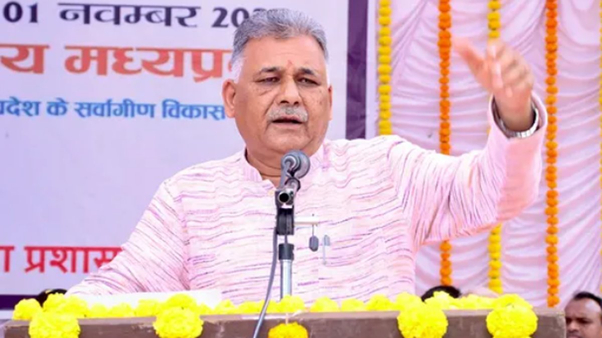 amitjyotiSe's tweet card. M.P. Minister claims Raja Ram Mohan Roy was a British agent promoting religious conversions, igniting controversy during Birsa Munda's anniversary event.