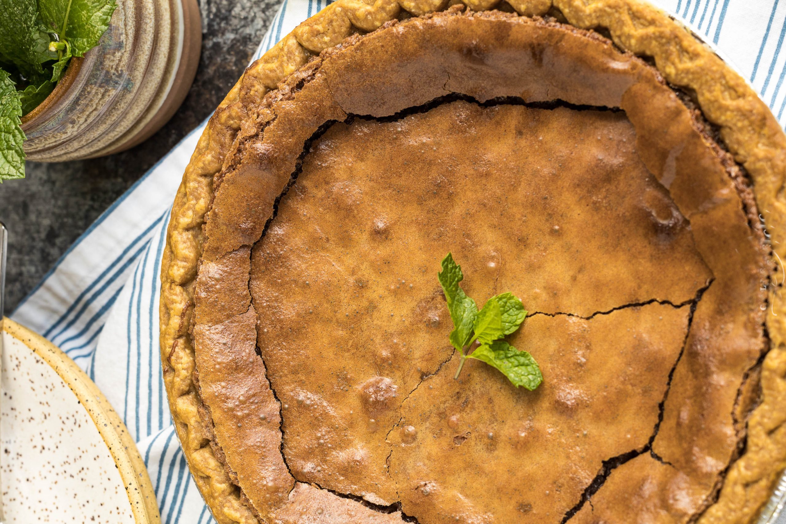 Paula_CallMePMc's tweet card. Warning: One bite of this Nutella Chess Pie and you’ll be hooked for life 🍫🥧 #pierecipes #callmepmc