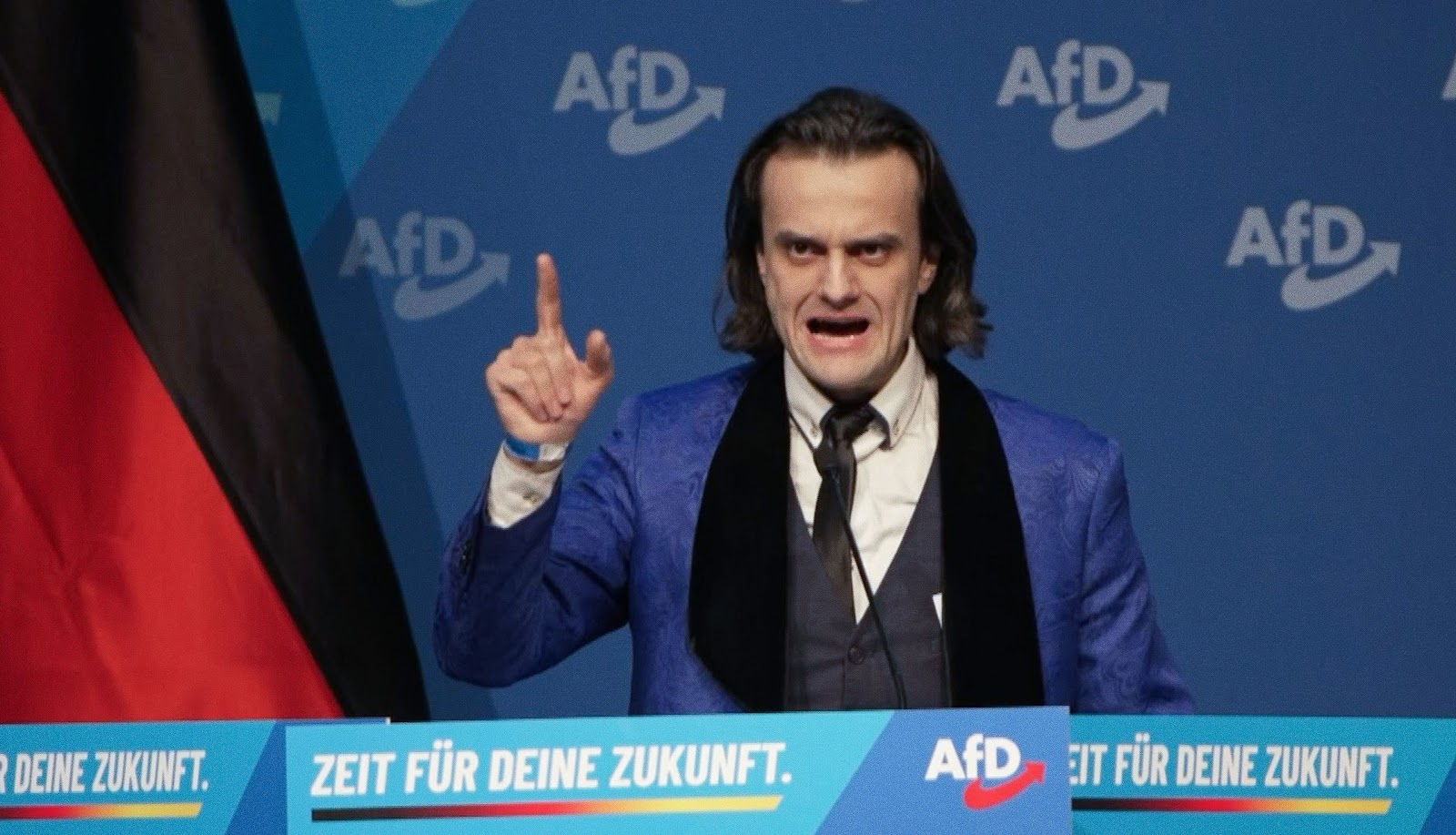 Der_Postillon's tweet card. Gießen (dpo) - Nach der skurrilen Bewerbungsrede von Alexander Eichwald beim AfD-Jugendkongress, die in Tonfall und Gestik an Adolf Hitler erinnerte,