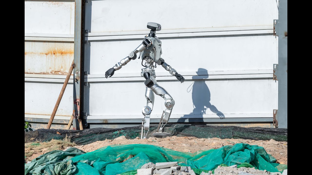 FrostyDesign_JP's tweet card. Full-Size Humanoid Robot Oli Walks Over Construction Debris