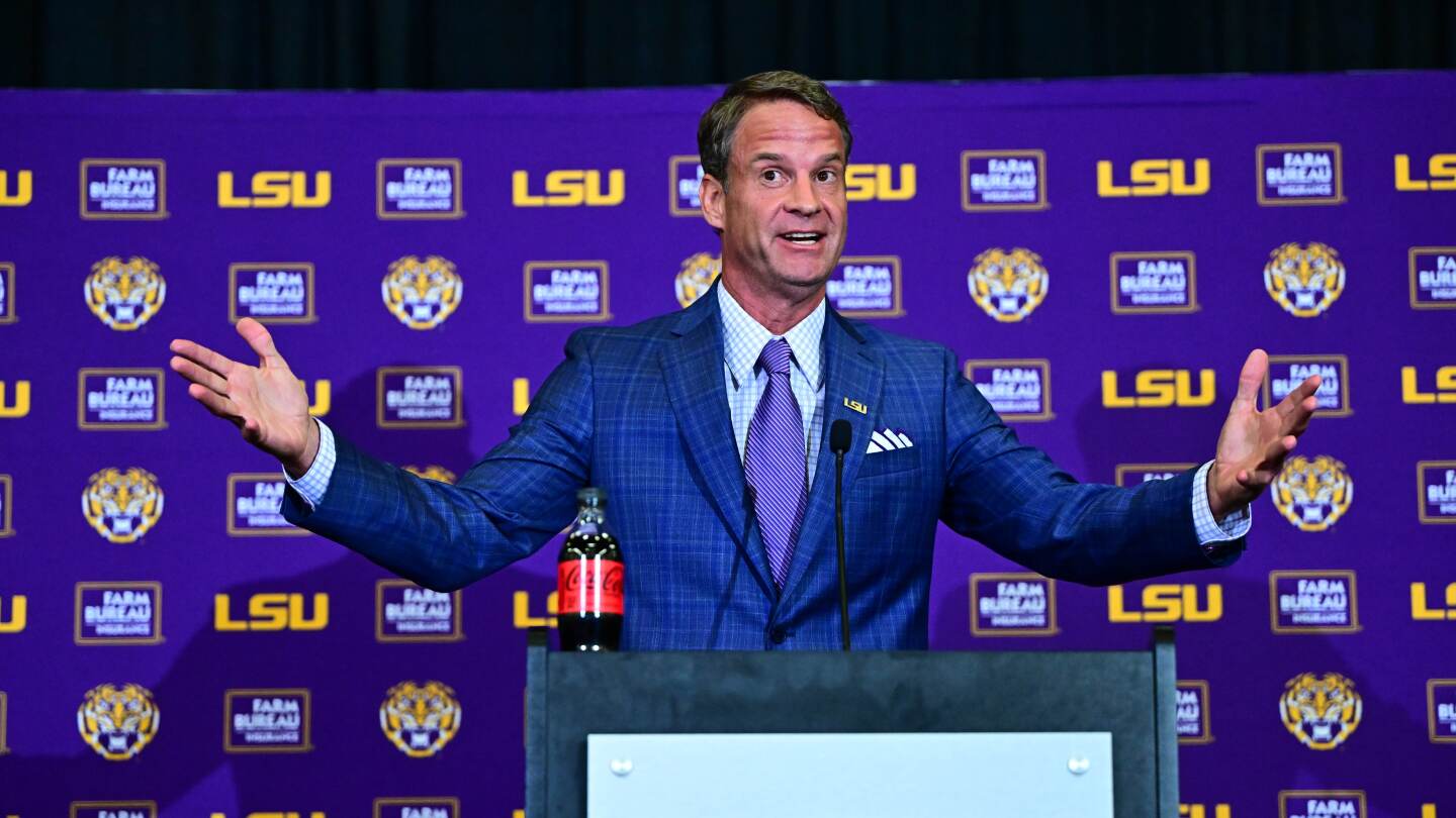 ProFootballTalk's tweet card. New LSU coach Lane Kiffin met reporters for the first time in Baton Rouge on Monday.