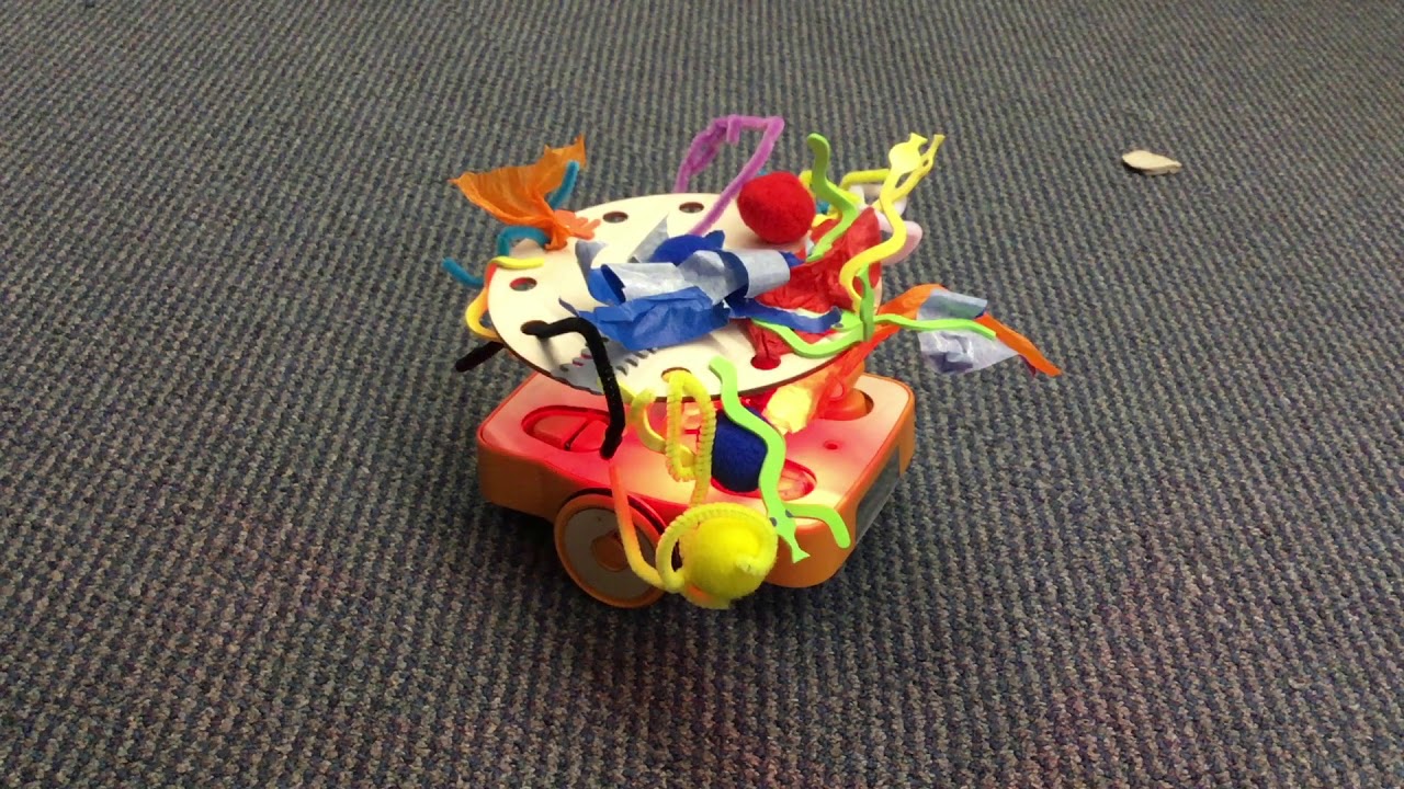 KinderLabRobot's tweet card. Rockin' Robots!