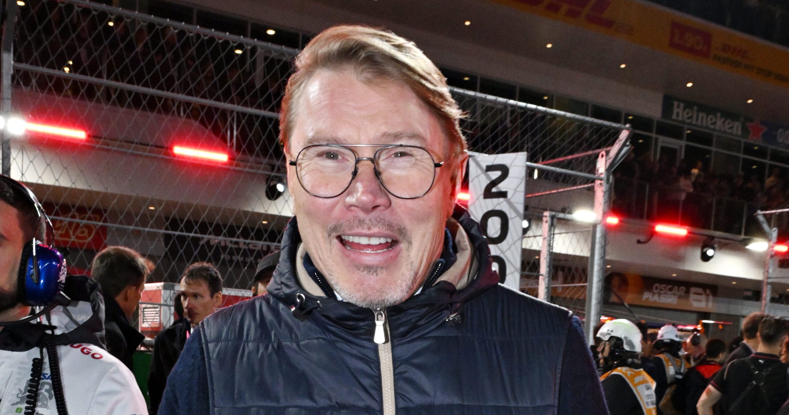 grand_prix_news's tweet card. Delve into the debated 'papaya rules' of McLaren's team strategy. Is Norris getting preferential treatment? Find out the surprising insights from ex-champion Häkkinen.