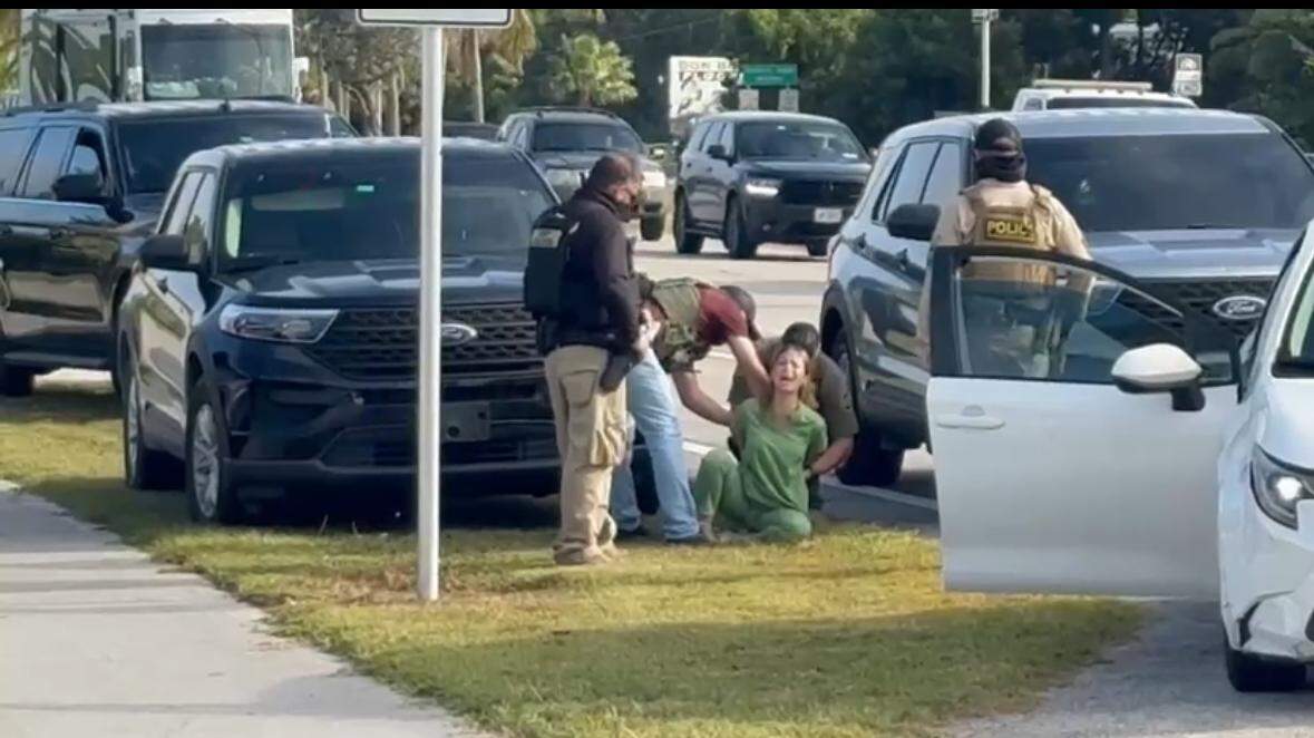 jkbjournalist's tweet card. In Key Largo, in front of Pink Plaza at mile marker 103.4, agents stopped a woman driving a white Toyota Corolla and surrounded the vehicle.
