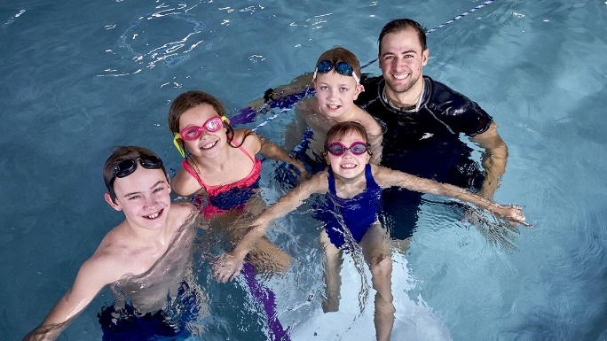 FCSwimtastic's tweet card. We teach love; love of our kids, love for our team, and love for our community. We don’t just teach swimming lessons.