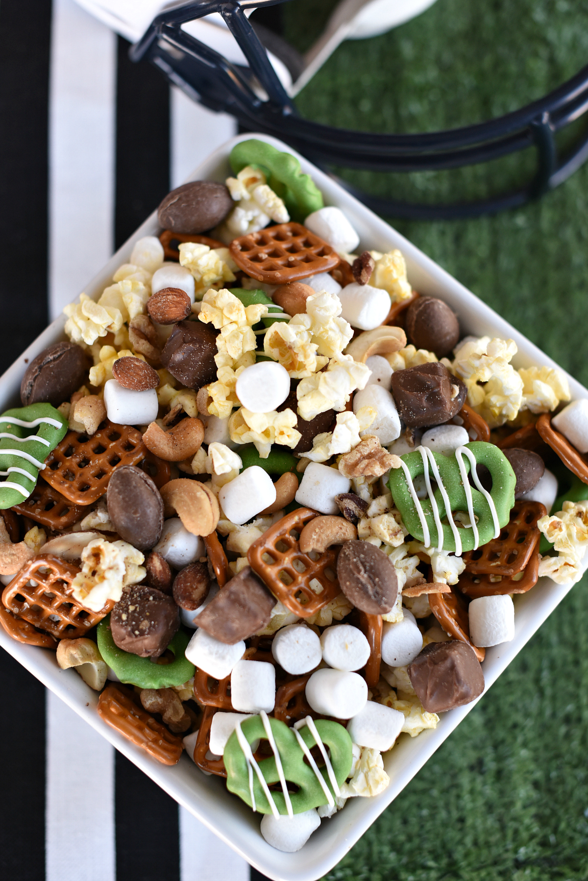 FunSquaredBlog's tweet card. Are you looking for winning game day snacks?  We have a simple and delicious football party mix for you.  Your guest will all be winners with this amazing snack.