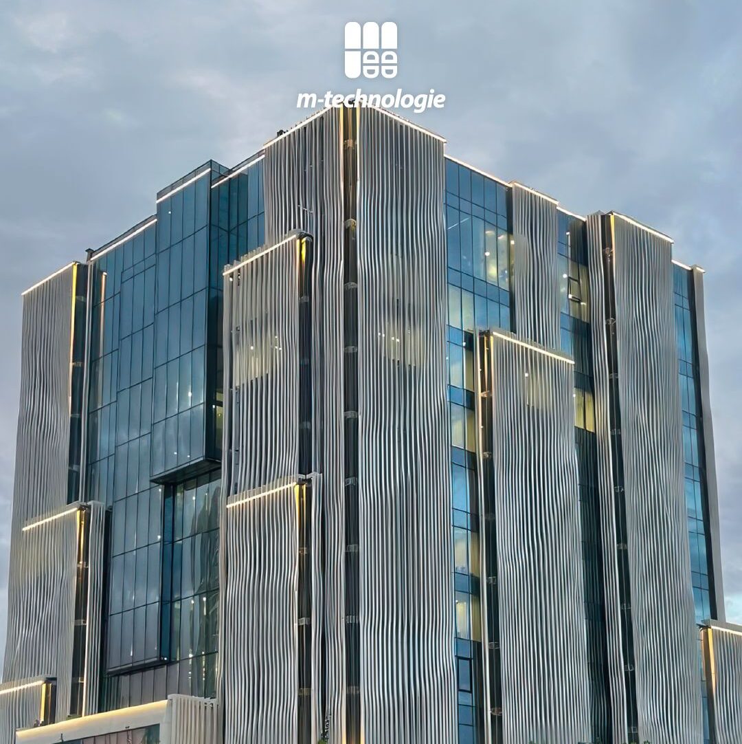GlassBalkan's tweet card. The National Bank of Kazakhstan commands attention not just through its scale, but through the fluidity and motion of its design. Conceived by Zaha Hadid Architects, the building presents sweeping...