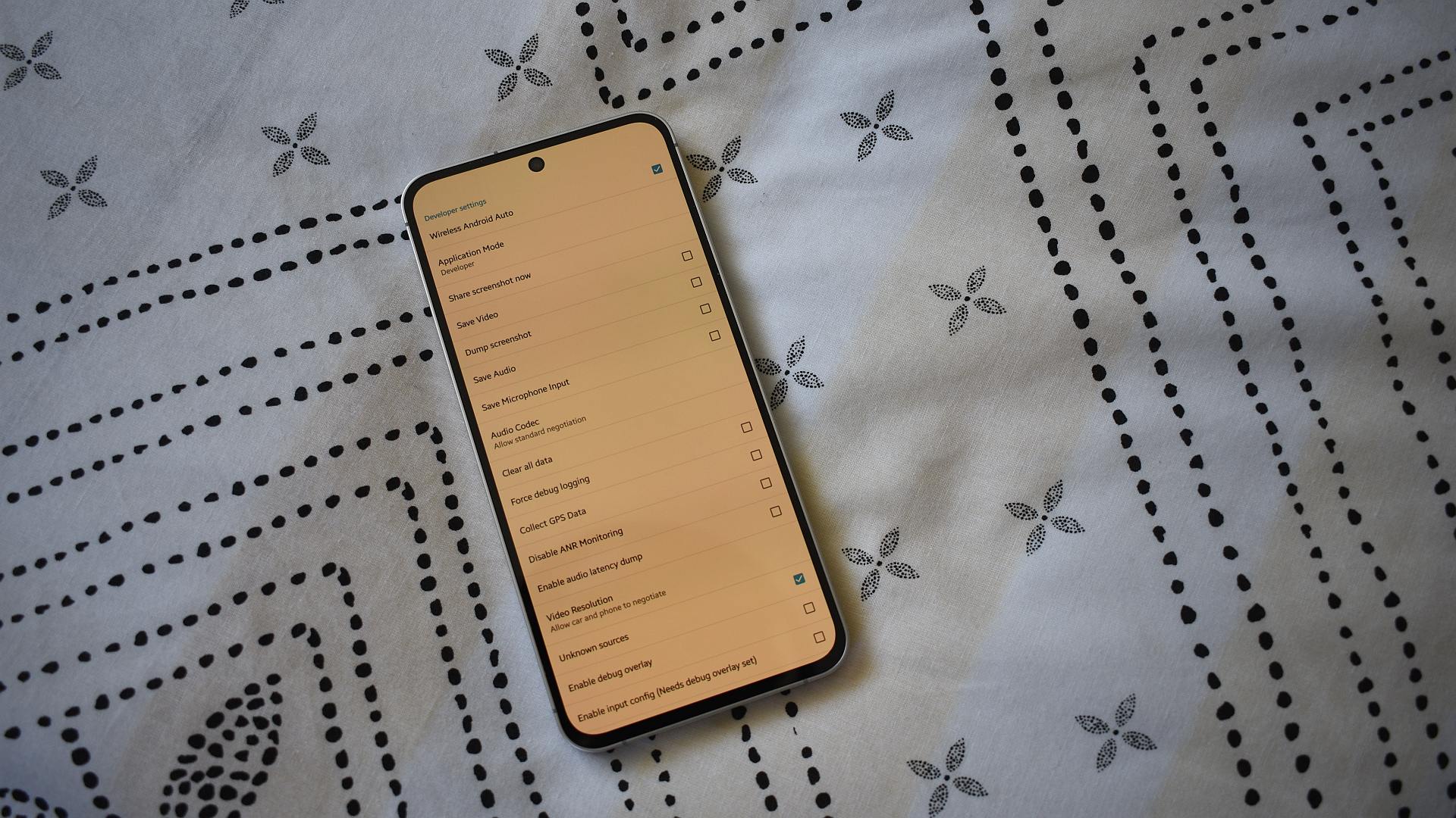 AndroidAuth's tweet card. Just like Android proper, you can unlock Android Auto developer settings on your car. But do you need to? Here's what you should know.
