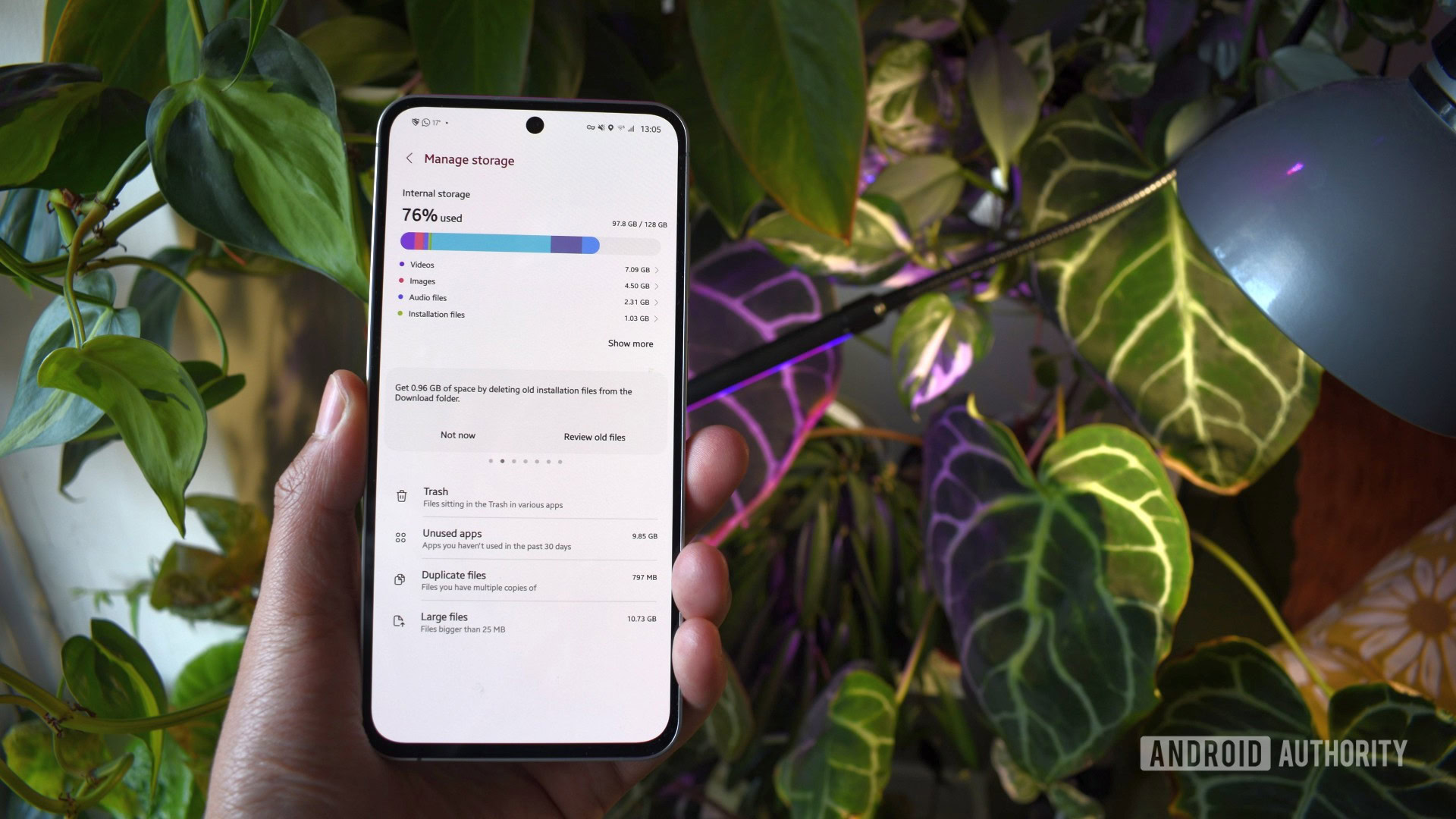 AndroidAuth's tweet card. Leaked One UI 8.5 code suggests a new My Files feature that helps clear storage when you travel, so you have room for vacation photos.