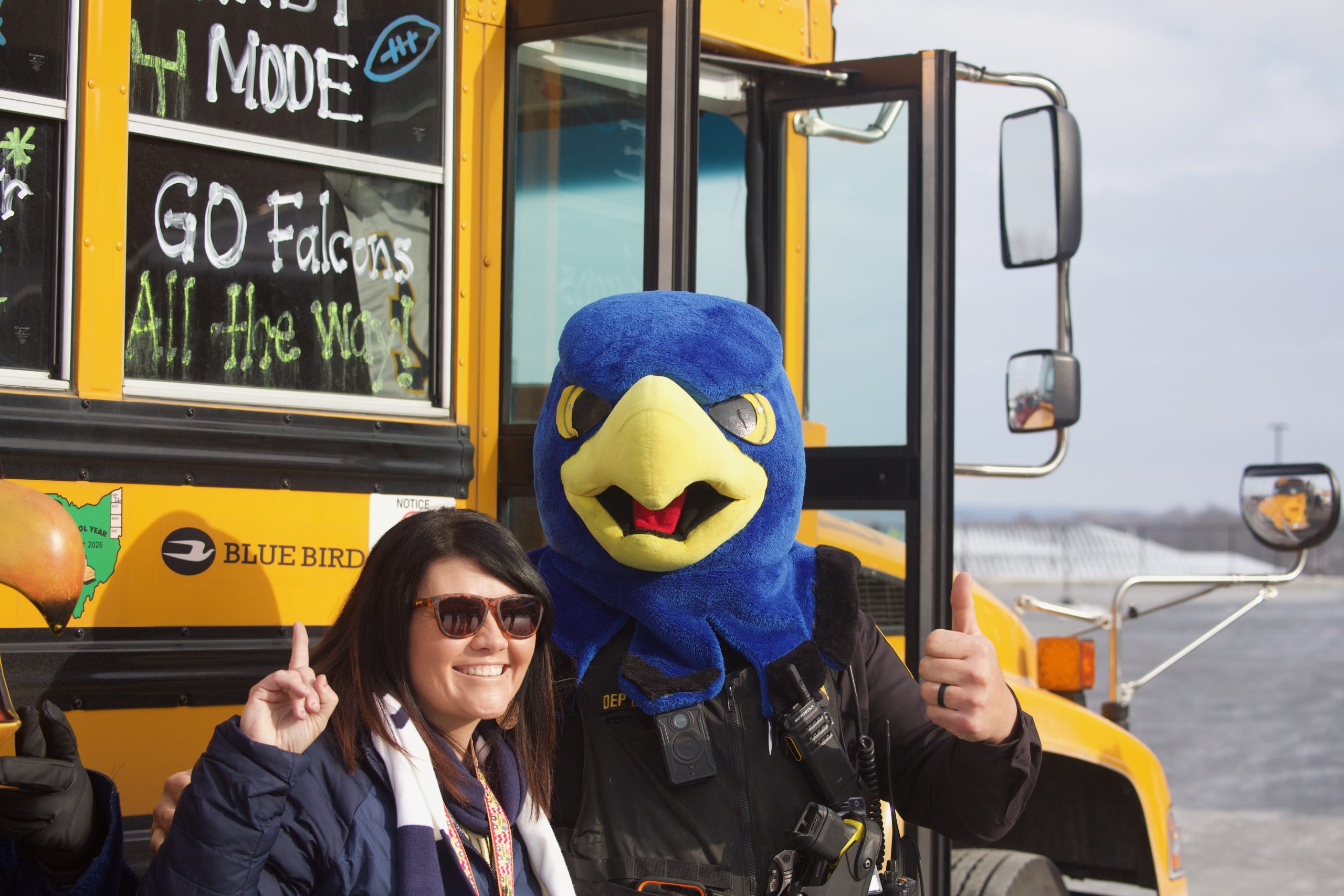 SourceMediaProp's tweet card. Parents, students, teachers and community members cheered for the Hillsdale football team players ahead of their trip to Canton.