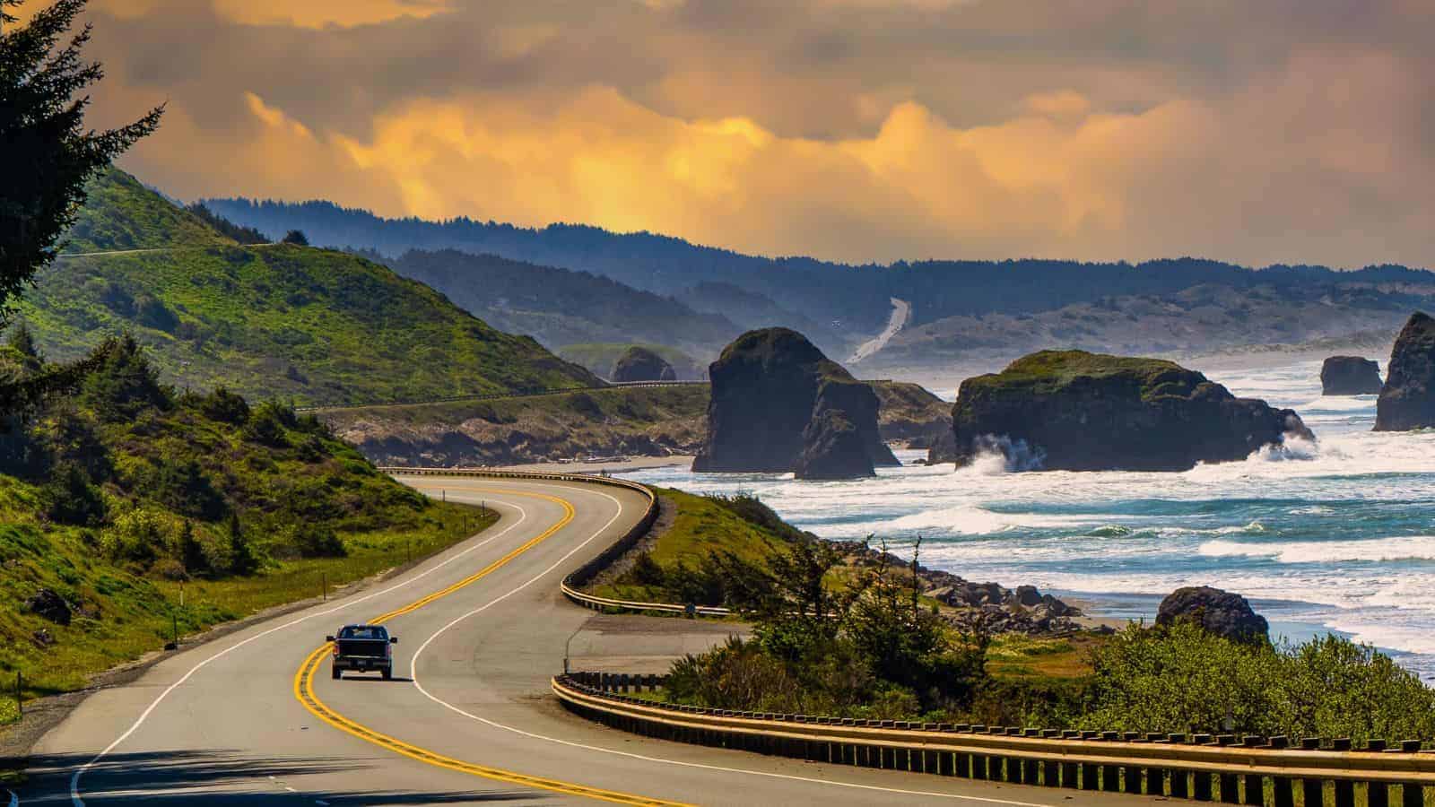 BlogBooty's tweet card. Embark on a breathtaking journey through America’s hidden gems with these 22 scenic road trips. From winding coastal highways to rugged mountain passes, each