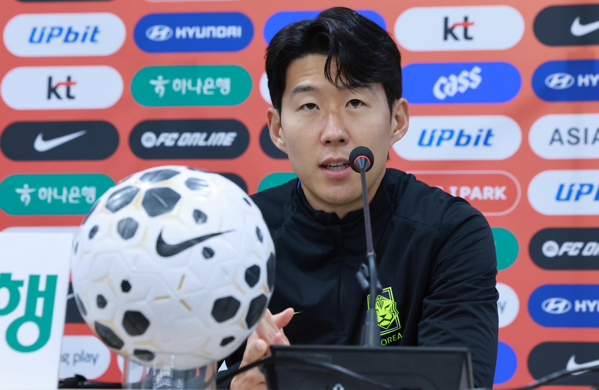 A woman and a man were each sentenced to prison terms Monday for  blackmailing football star Son Heung-min with pregnancy claims. The Seoul  Central District Court sentenced the 20-something woman, surnamed Yang,
