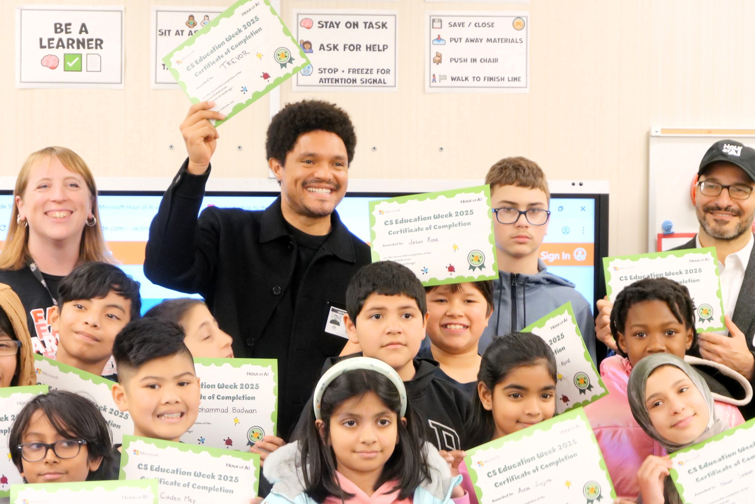 BradSmi's tweet card. Trevor Noah joined a 5th grade computer science class in Bellevue for Code.org’s Hour of AI, a Microsoft-supported initiative, learning alongside students and sharing why he believes kids have an...