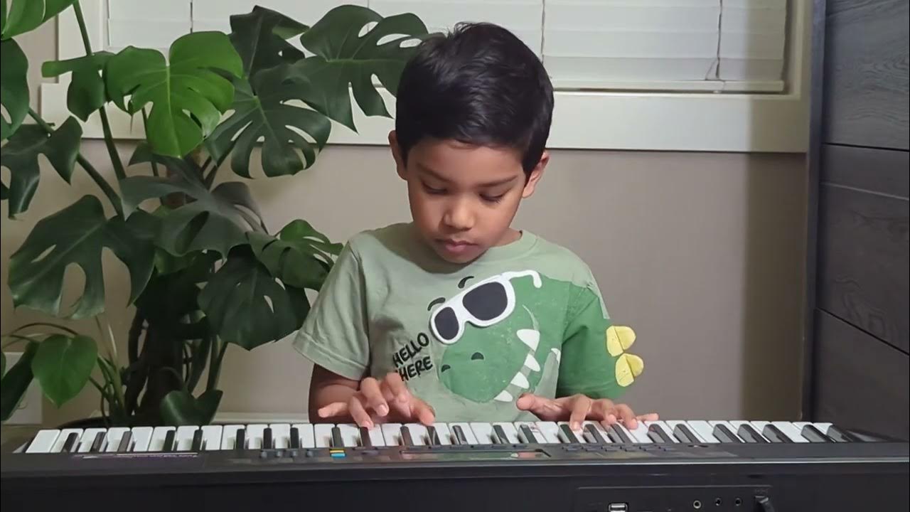 _vigneshh's tweet card. Jurassic Park Theme Piano Version l 5 year old kid
