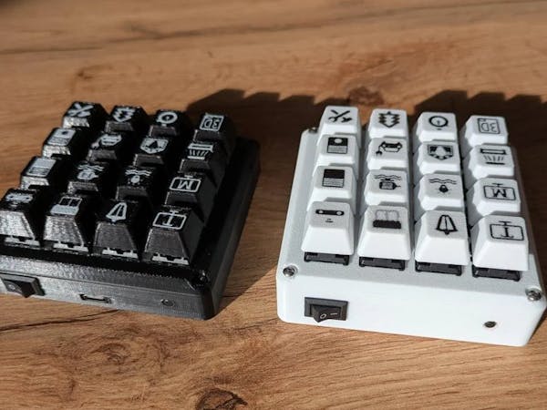 Hacksterio's tweet card. Tired of misheard voice commands? Thomas built a DIY 16-key Zigbee macropad powered by an ESP32-C6 for smart home control.