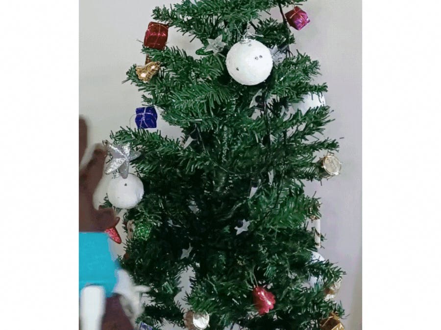 Hacksterio's tweet card. Develop a simple, low-cost AI-powered wearable with the XIAO nRF52840 Sense that detects hand gestures and controls real-world devices.