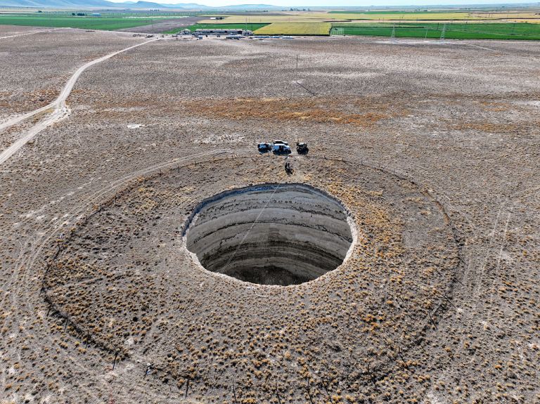 pmagn's tweet card. Experts say sinkholes more than 200 feet deep began appearing in the 2000s, driven by drought and extensive groundwater extraction.