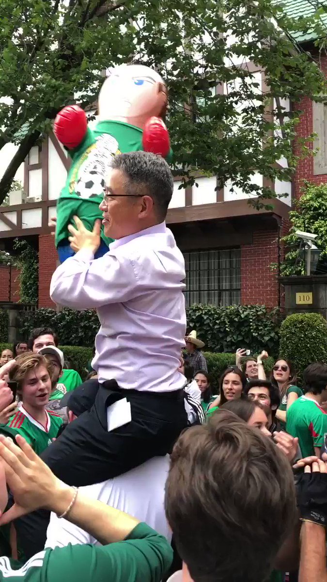 That’s the Korean consul general to Mexico, Byoung-Jin Han, celebrating with grateful Mexican fans outside the Korea embassy here. One fan said he took a shot of tequila with them earlier.