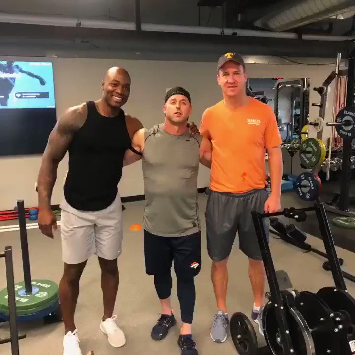 Do the work & make it a lifestyle. Just like in the season, Peyton’s in the background stretching, getting ready to throw and I’m pushing the sled getting ready to knock somebody out. Not much has changed... we’re still doing the work 💪🏾 #HumpDay #FitFam #Vibes @Broncos