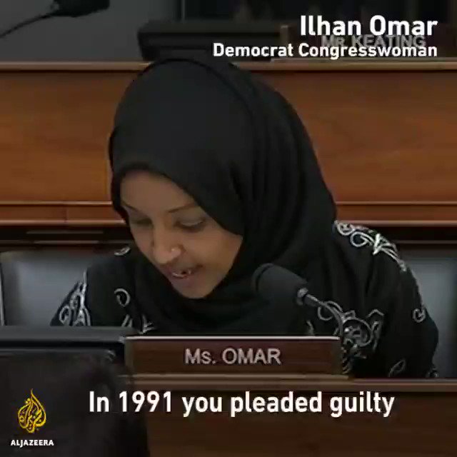 Pain of a white man being grilled by a refugee muslim woman in his own centre of power. You can see it on his face.