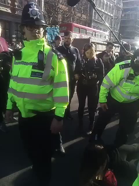 Young girl forced to the floor and arrested. Classmates really upset. No explanation. #schoolstrike4climate
