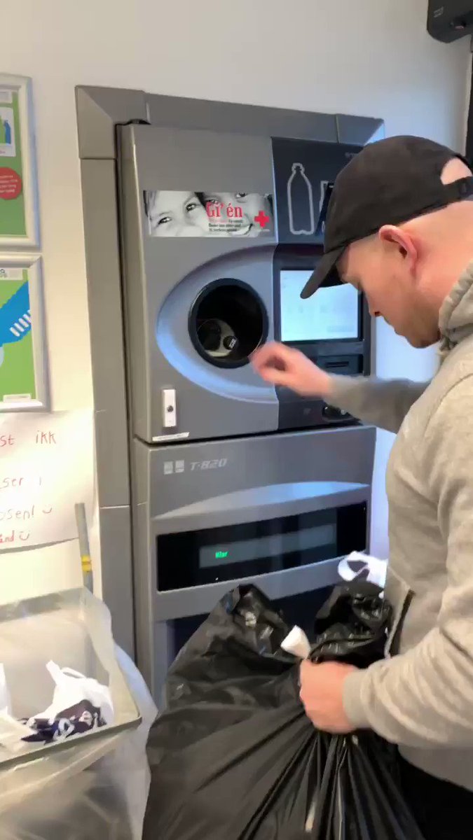 Saving the planet & getting money back - Danish style. All Danish supermarkets have these machines - which you load up with empty cans, bottles of all kinds, in return for cash, paid out in a receipt that can be used or cashed in the store. Approx 20p a bottle/can. Works well