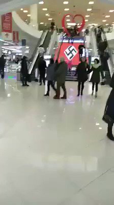 Meanwhile - shopping mall in Kiev adorned with a giant swastika