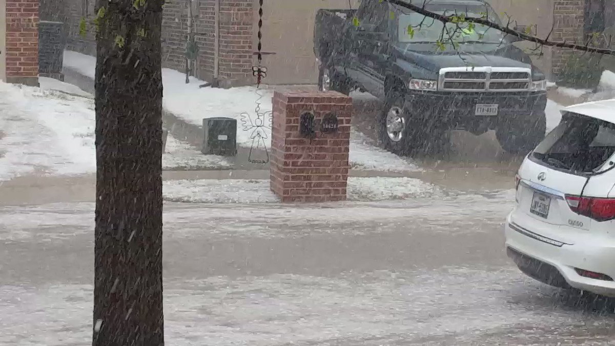 Post hail storm west McKinney. There was also torrential rain. The current flipped trash cans over, and trash was flowing down the street, too. But I didn't video the milk jugs floating along. 😂 #dfwwx