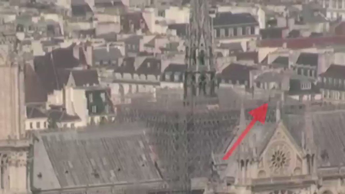 BREAKING:::
New video surfaces from nearby public web cam before the fire started showing a moving figure followed by a flash.
Source: http://viewsurf.com at 17:05
#NotreDameFire #NotreDameCathedral