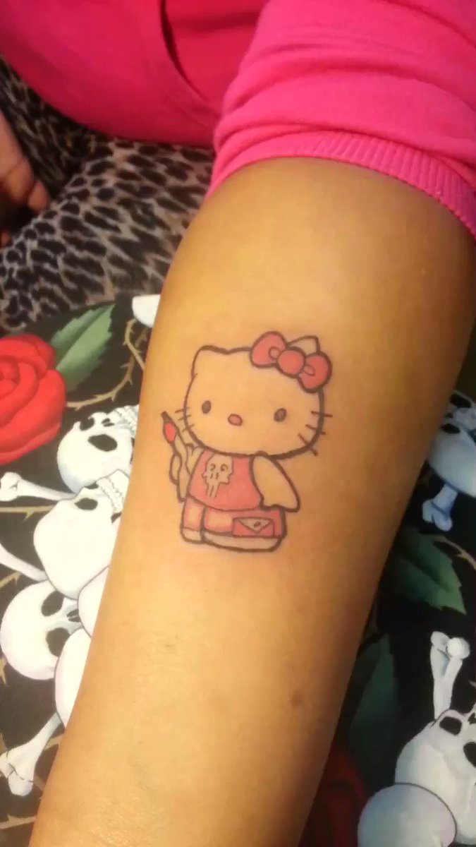 Sleeve tattoo of Hello Kitty  Hello kitty tattoos Tattoos Cat tattoo