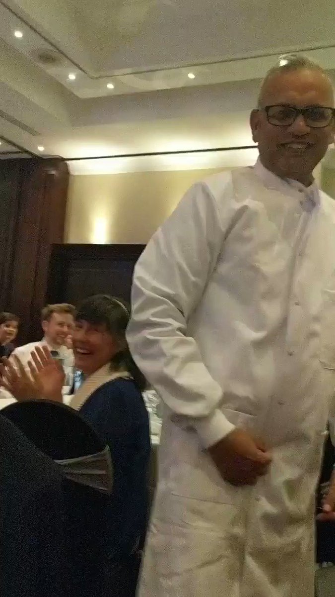 Nasir won the raffle and now a proud owner of a @NEBiolabs lab coat