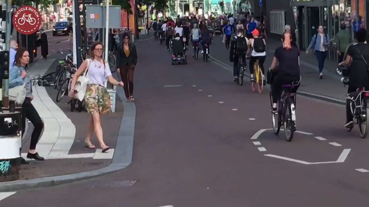 To an outsider used to walking across a car-dominated street, crossing a busy cycle track might appear difficult at first.
But with the traffic moving far slower—and the ability to make eye contact and adjust speed—the truth is it that it's much easier.
https://bicycledutch.wordpress.com/2019/06/12/how-hard-is-it-to-cross-the-cycle-path/ …