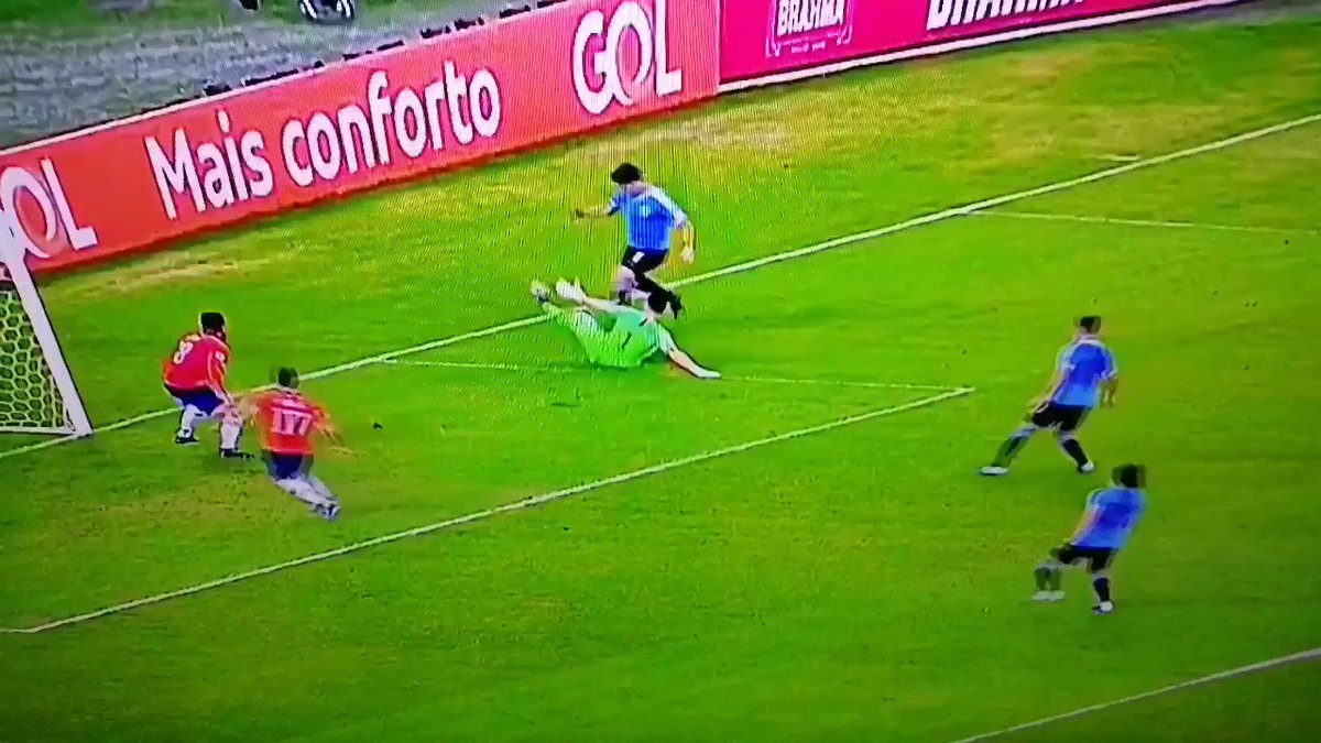 Here's Luis Suárez appealing for a handball, and penalty because Chile's GK handled it in the box: