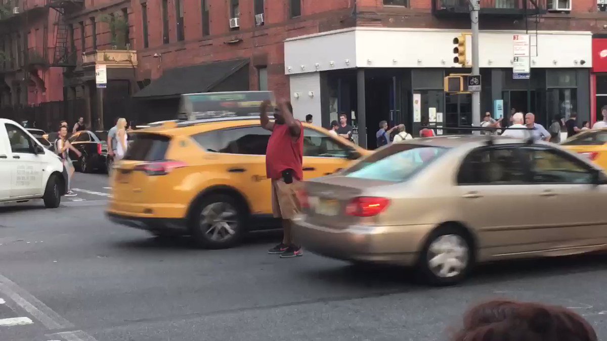 For the last 45 minutes this man has kept the intersection alive. @CoreyinNYC @BilldeBlasio this is New York