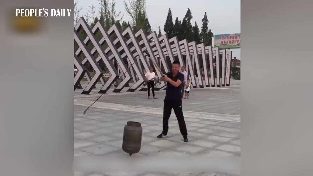 Chinese uncles take spinning top to another level: gas tank! #kungfu