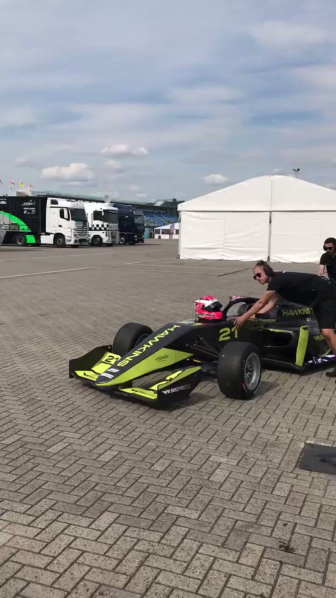 Seconds out... @WSeriesRacing #FP2. Our drivers always help push their cars through the paddock to the pit-lane, ready for the off. A study in concentration from @1JessicaHawkins, a tense smile from @Sabre_Cook & a happy wave from @FWohlwend5. #WhateverWorks
