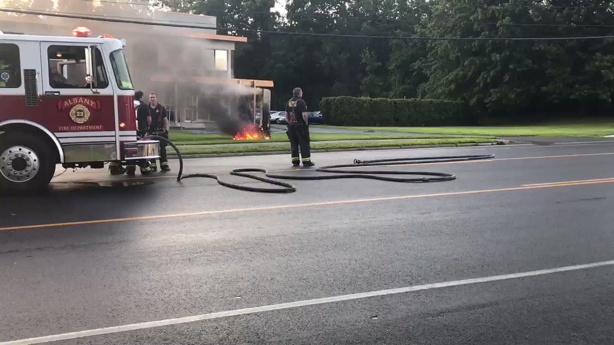 Power lines down in front of @WTEN fire crews on scene waiting to cut the power so they can water it down.
