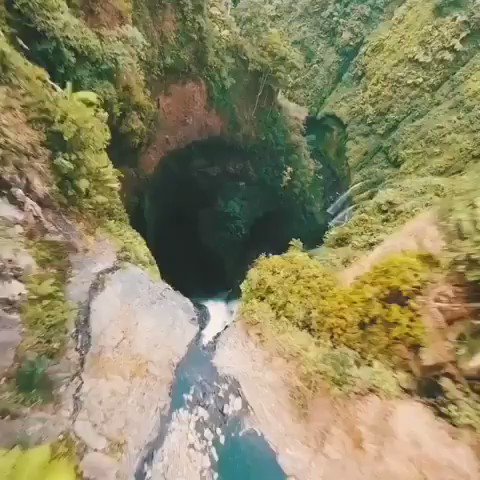 Incredible drone shot gliding down a waterfall 😊💗