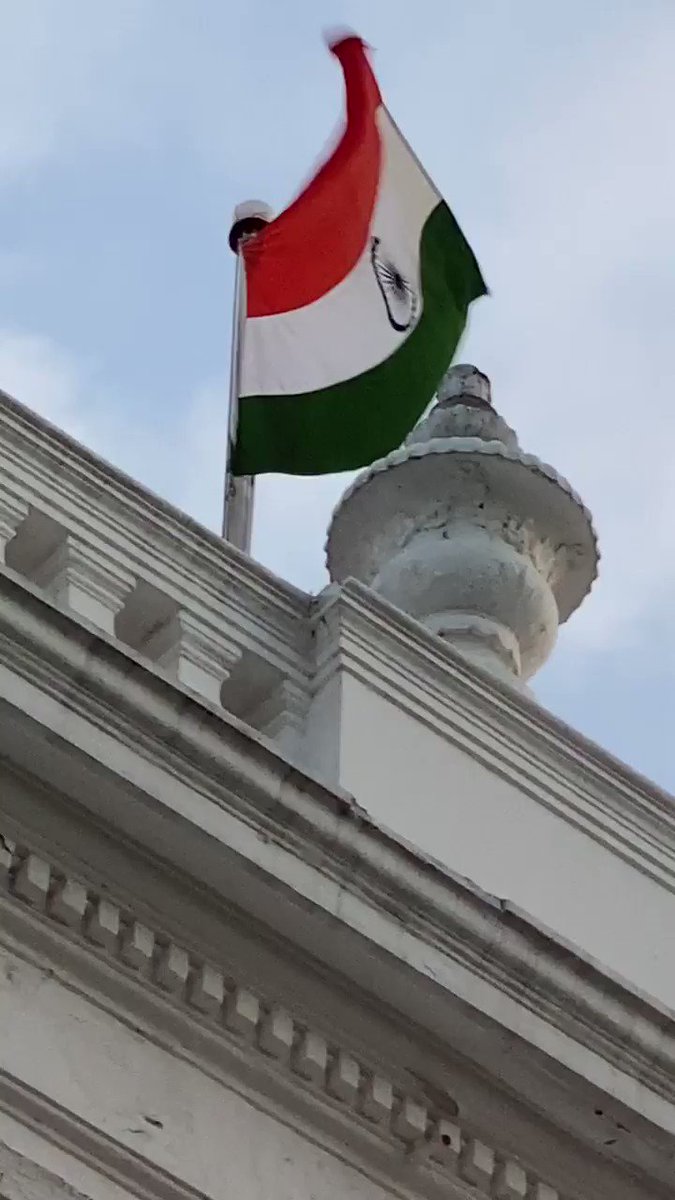 Recorded the flag flying high atop RajNivas this morning while on my morning walk below. (6.20AM)