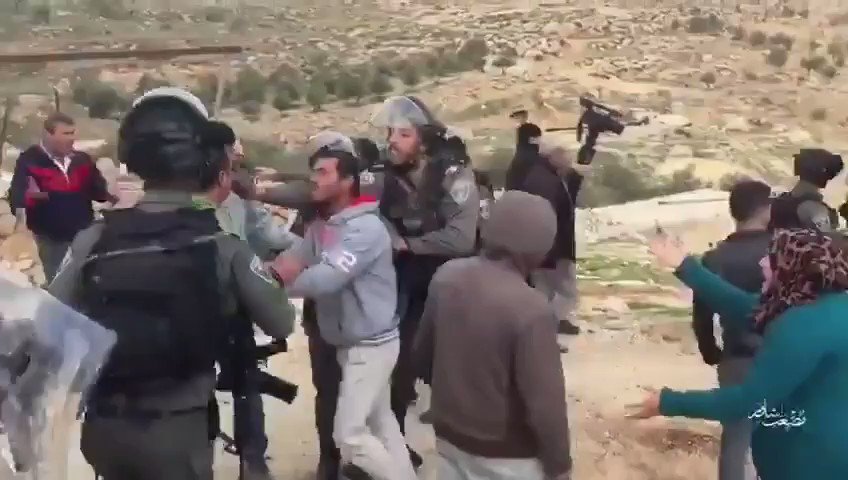 Watch 👀Israeli ethnic warcrimes in practice Zionist "soldiers" assault & abduct Palestinians during their continued demolition/#EthnicCleansing/colonisation project in PalestineThis time, Yatta village becomes victim of the zionist terrorists .