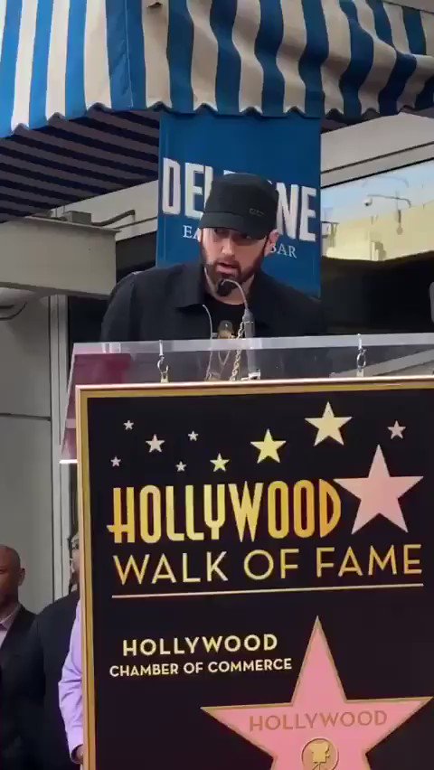 50 Cent getting his Star on the walk of fame while flanked by Dr Dre and  Eminem. Some white-hot kicks on…