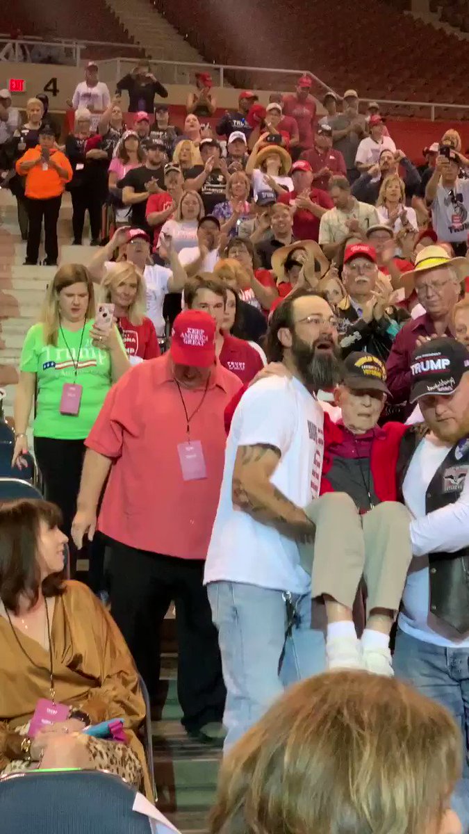 This happened at the @realDonaldTrump rally in Phoenix. Lots of teamwork here. These men carrying a World War II veteran to his seat. Got to admit I got a lump in my throat