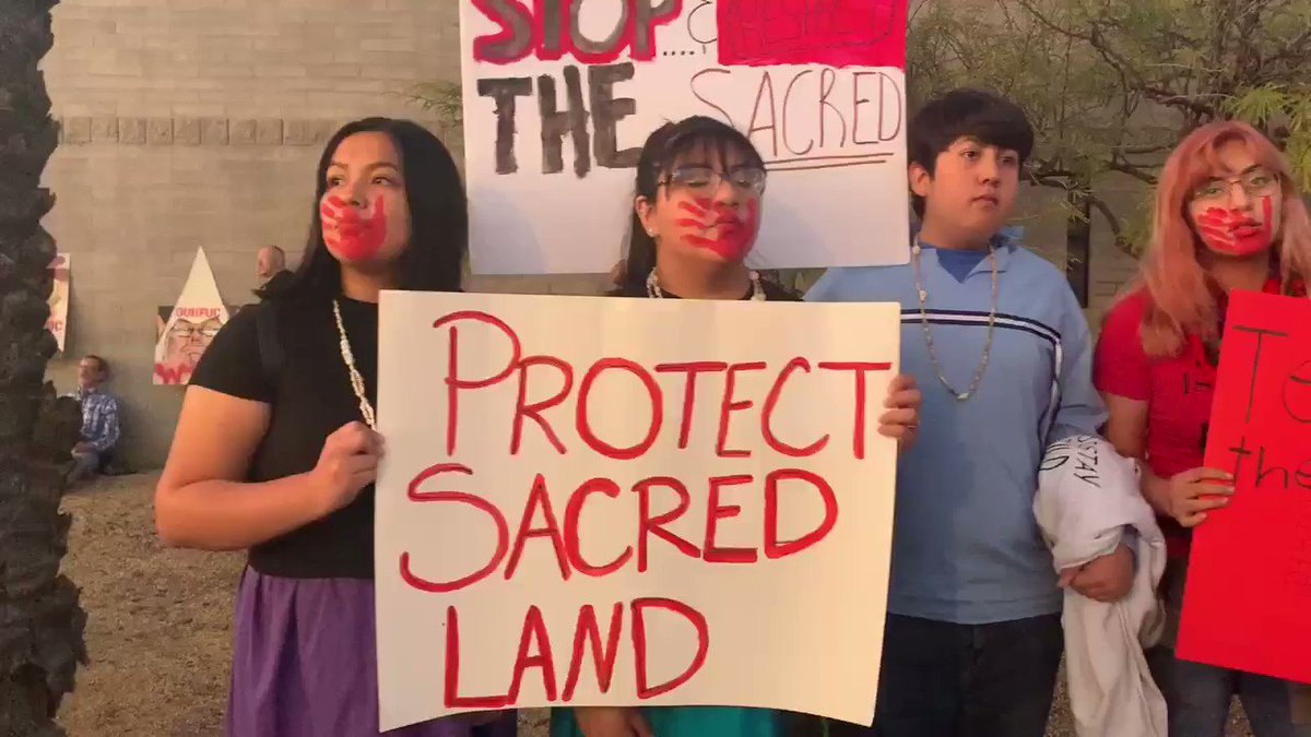 Some members of the Gila River Indian Community are protesting President Trump's rally in support of the Tohono O’odham tribe, whose sacred site was blasted to make way for Trump's border wall in southwestern Arizona. #TrumpInAZ #TrumpRallyPhoenix
