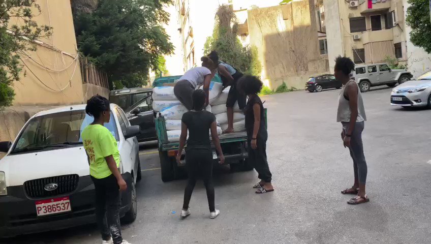 Ethiopian women at work. At the service of domestic workers in Lebanon, women and children, no matter the race, creed or nationality. Before packing food we buy in stock like this, pile the heavy load onto a truck for transport. What men can do...women can do better. #Girlpower https://t.co/40YL6eeO63