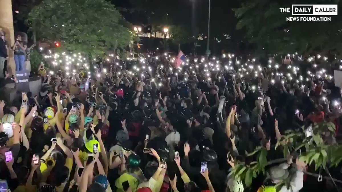 Portland crowd singing āhands up, please donāt shoot meā with their phone lights on. https://t.co/dqOgRJrM3Z